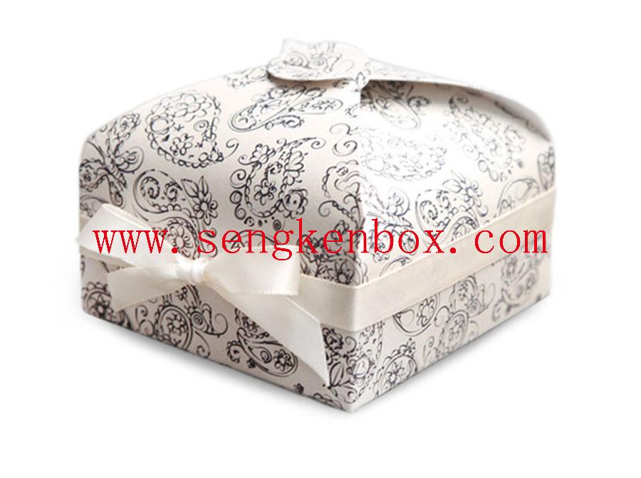 Faltbare Geschenkbox aus Macaron-Dessertpapier mit Schleife