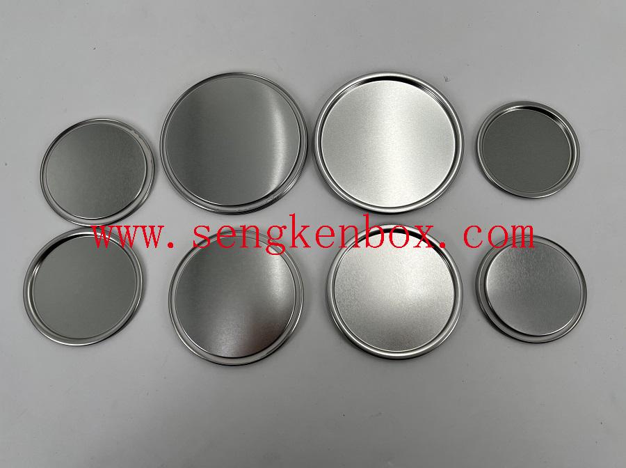 Silberne runde Weißblechdeckel aus Metall mit flachem Boden